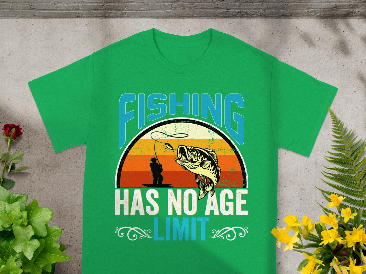 Green t-shirt with "FISHING HAS NO AGE LIMIT" text and a fishing graphic.