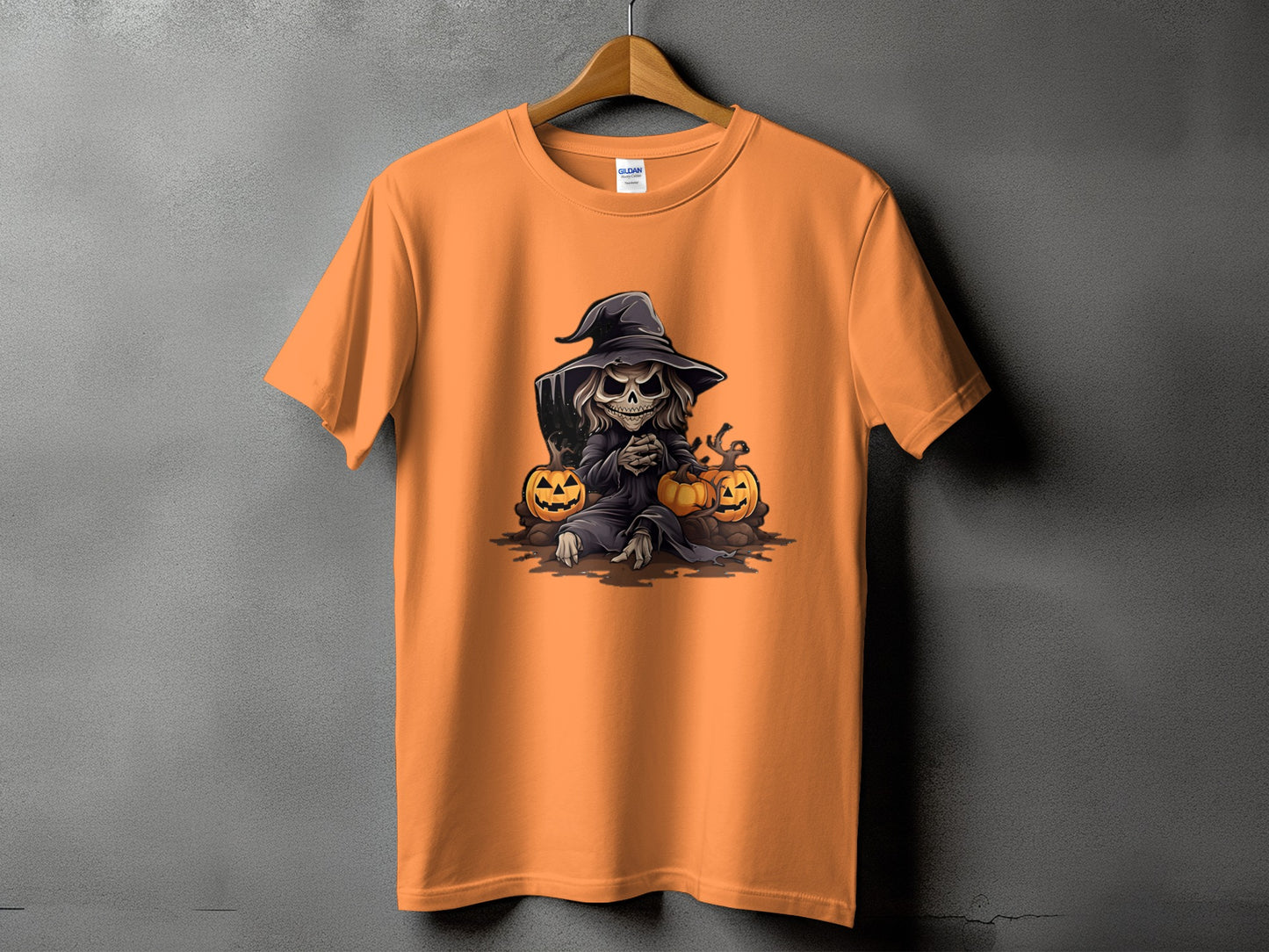 Orange t-shirt with Grim Reaper, pumpkins, and tombstone Halloween graphic.