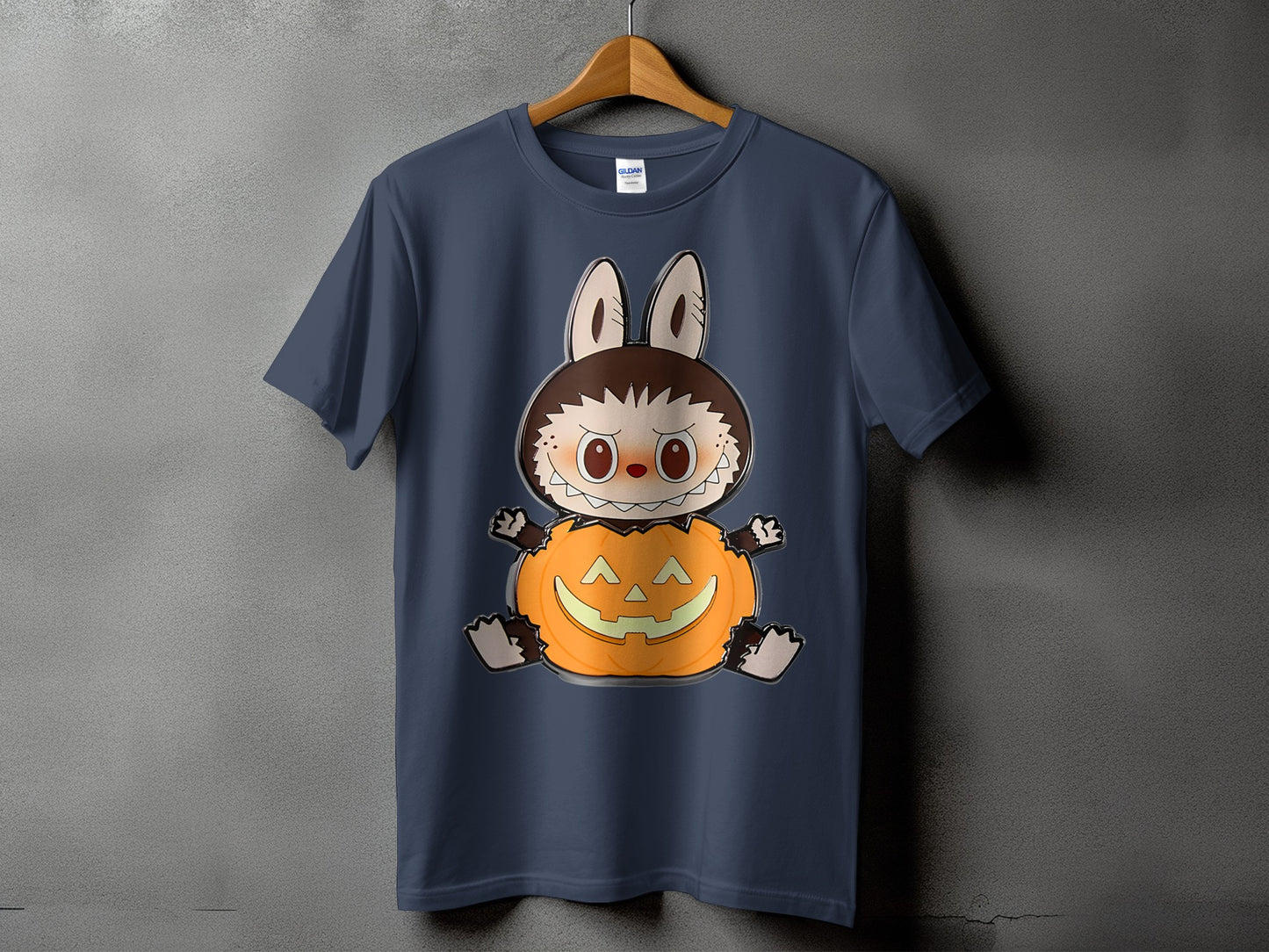 T-shirt with a cartoon character sitting in a jack-o'-lantern.