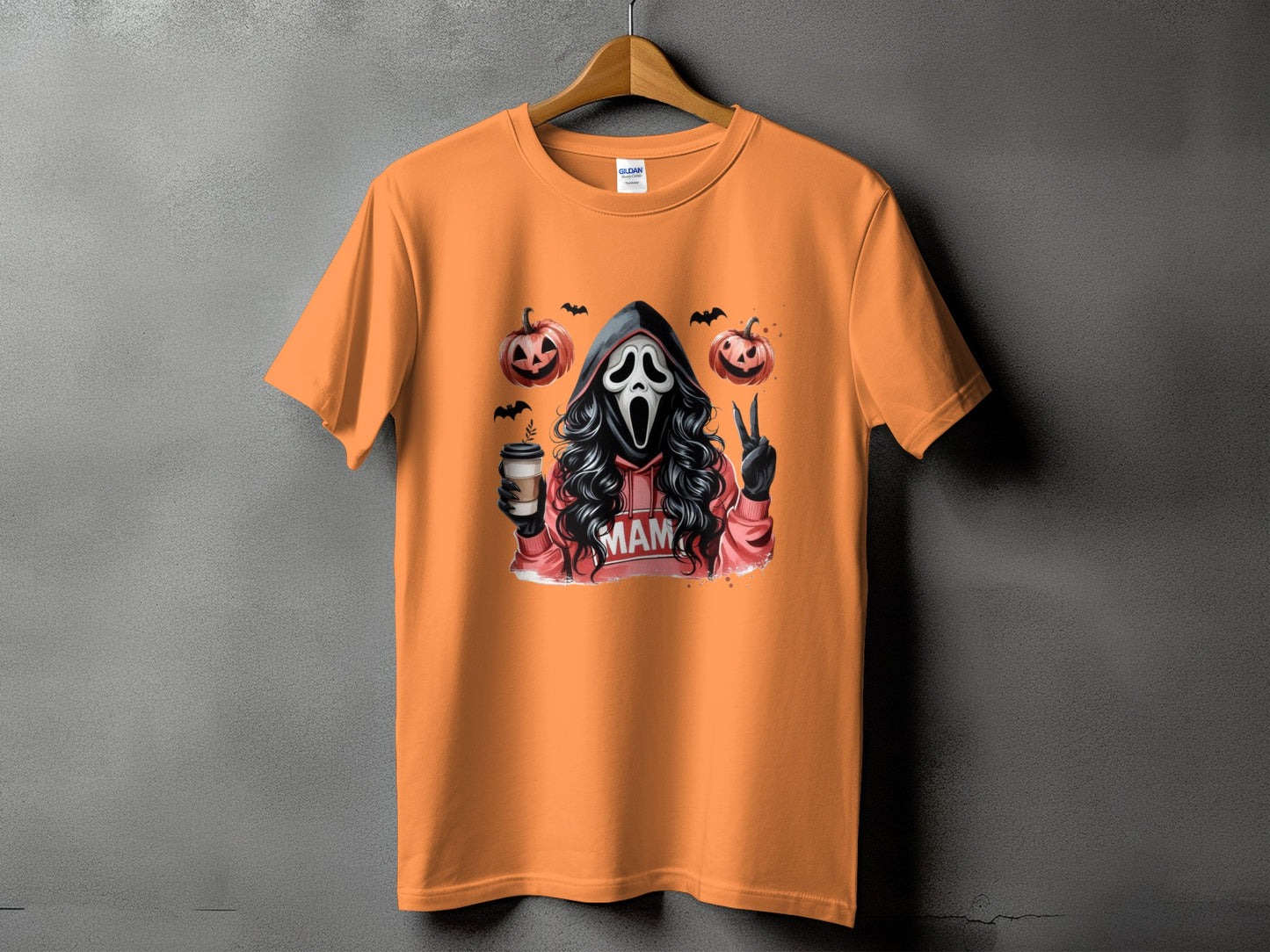 Orange t-shirt with Ghostface, pumpkins, bats, coffee cup, and "MAM" text.