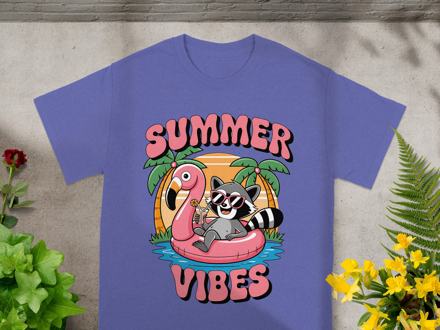 Raccoon with sunglasses drinking on flamingo float under "SUMMER VIBES" text.