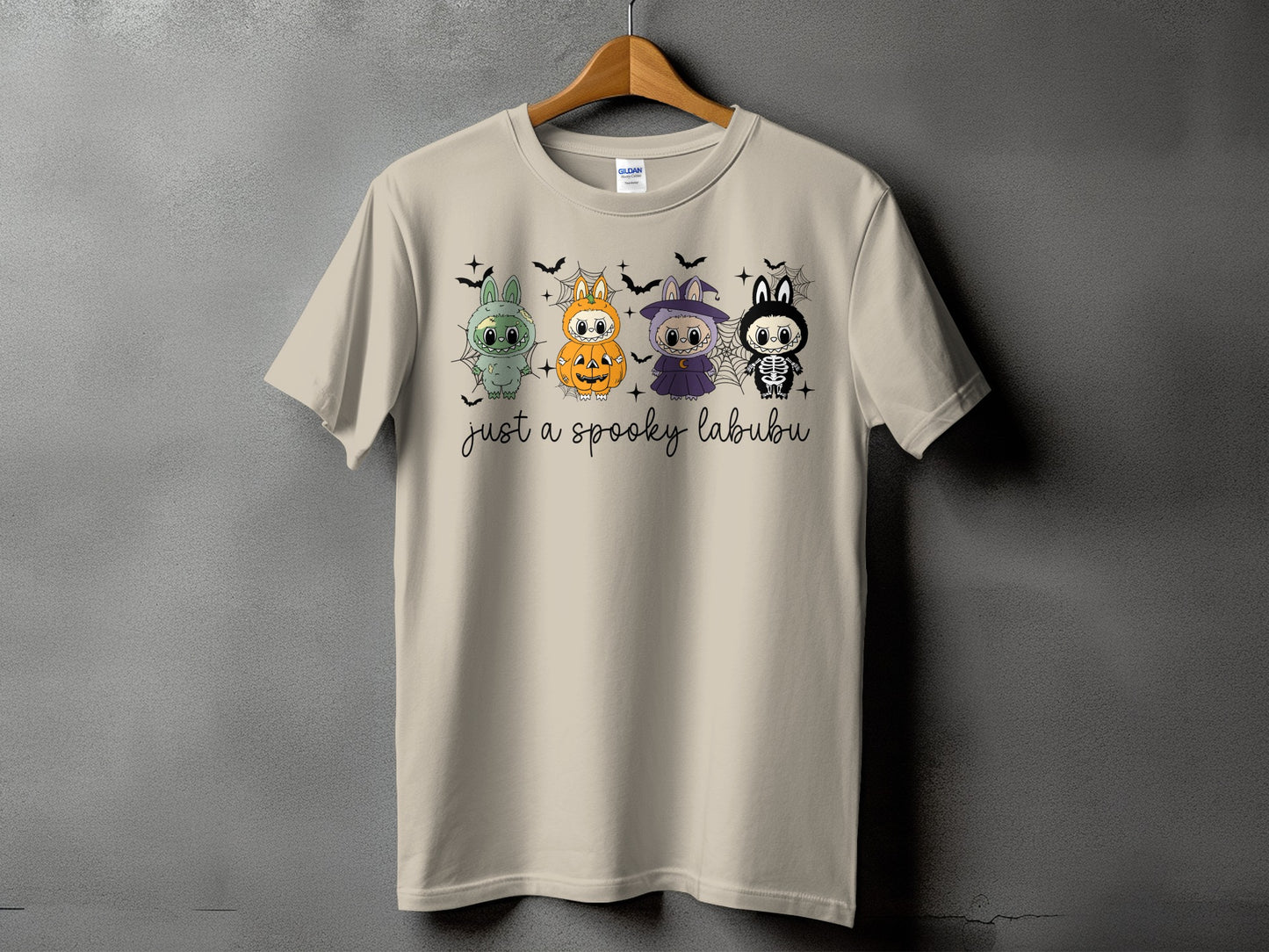 T-shirt with four cartoon characters and "just a spooky labubu" text.