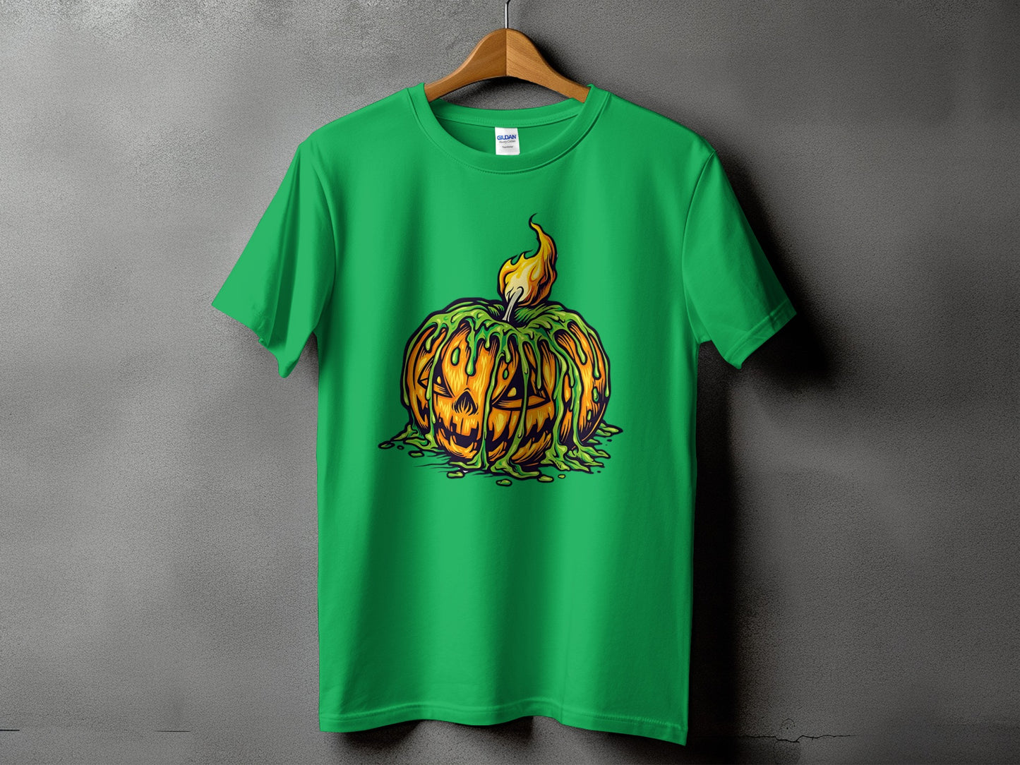 Green t-shirt with a melting jack-o'-lantern graphic and flame.