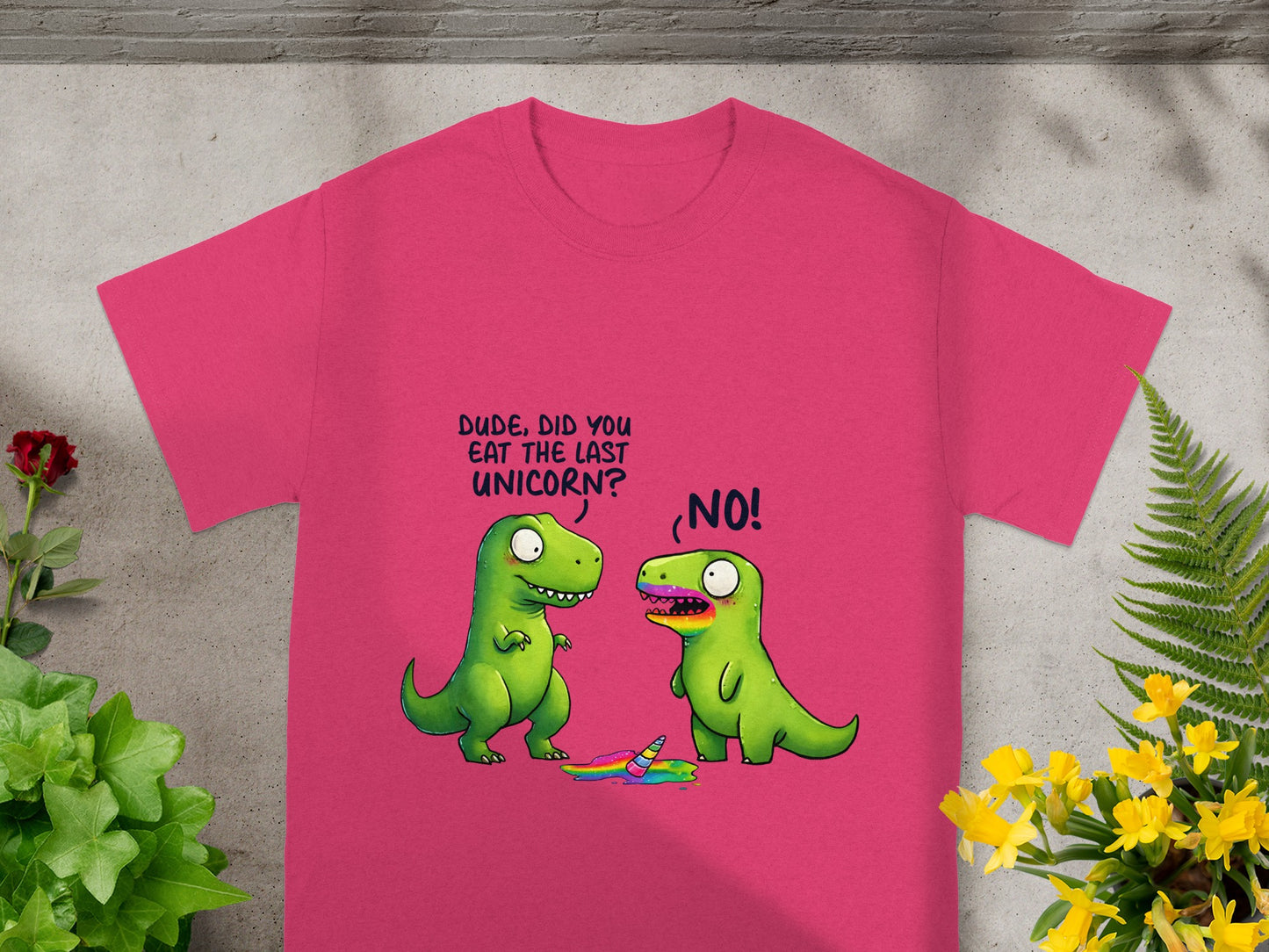 Two green dinosaurs, one asking "Dude, did you eat the last unicorn?", the other smeared with rainbow.