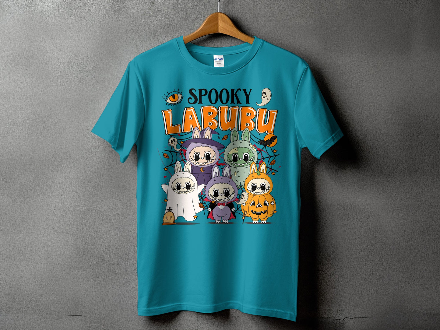 Teal t-shirt with "Spooky Labubu" Halloween graphic featuring costumed characters.