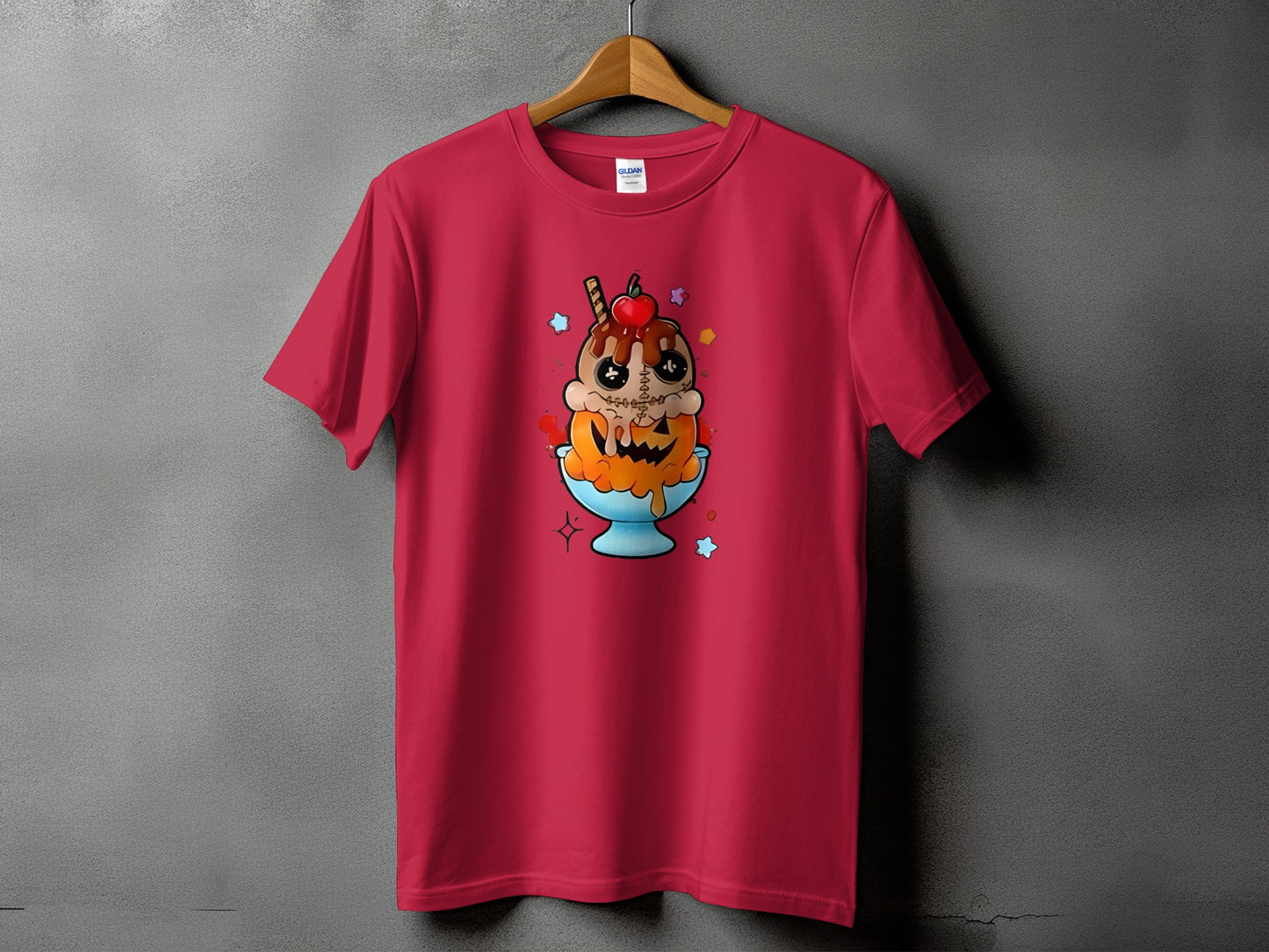 Red t-shirt with a spooky ice cream sundae design featuring a pumpkin and stitched details.
