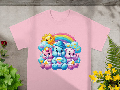 Three Care Bears characters on a pink t-shirt with a rainbow and sun.