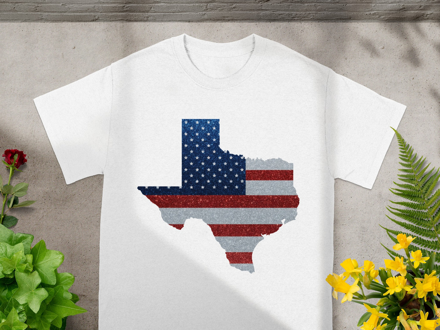 White t-shirt with Texas outline featuring a distressed American flag design.