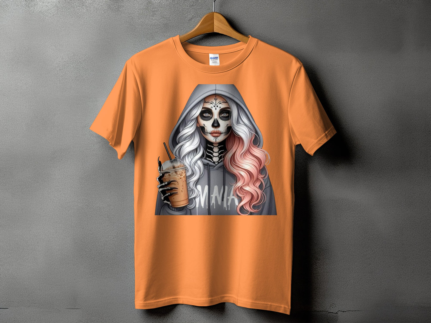Orange t-shirt with graphic of a skull-faced woman in a hoodie holding a drink.