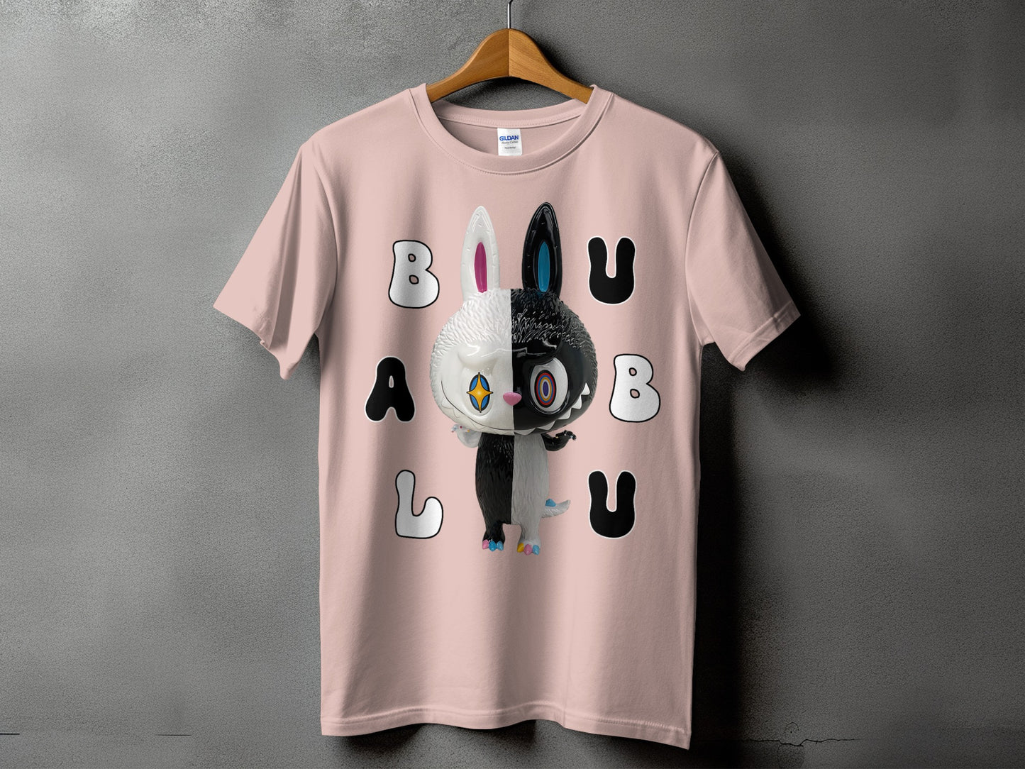Pink t-shirt with a black and white bunny character and the text BULABUL.