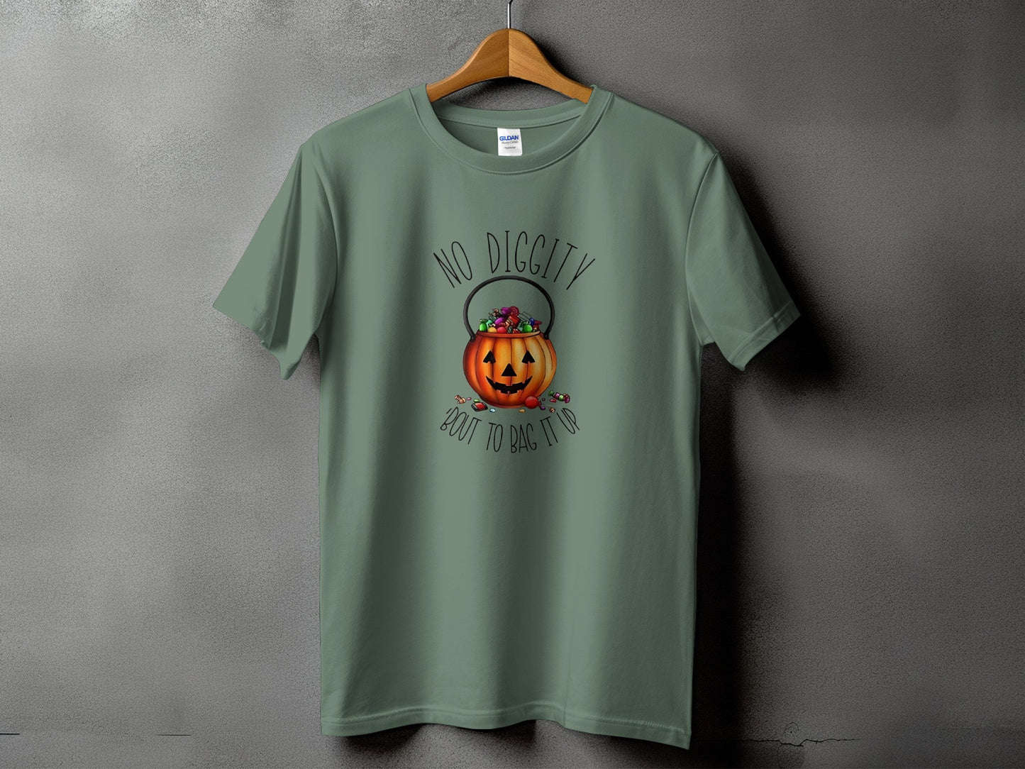 Green t-shirt with jack-o'-lantern candy bucket graphic and "No Diggity Bout to Bag It Up" text.