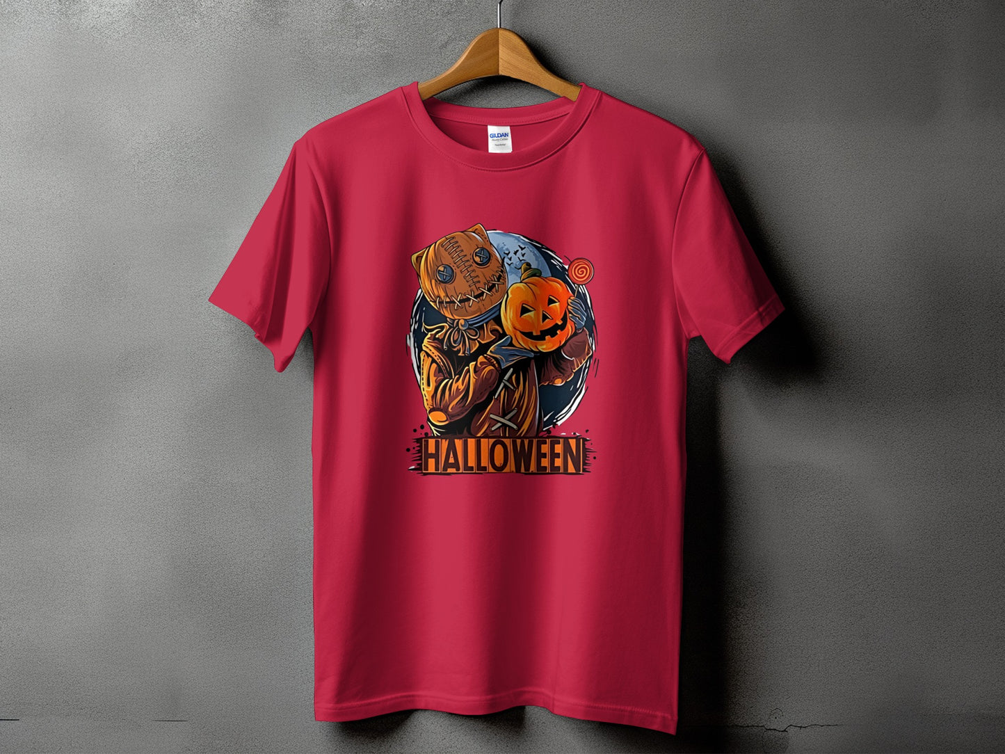 Red t-shirt with a stitched jack-o'-lantern character holding a pumpkin and candy.