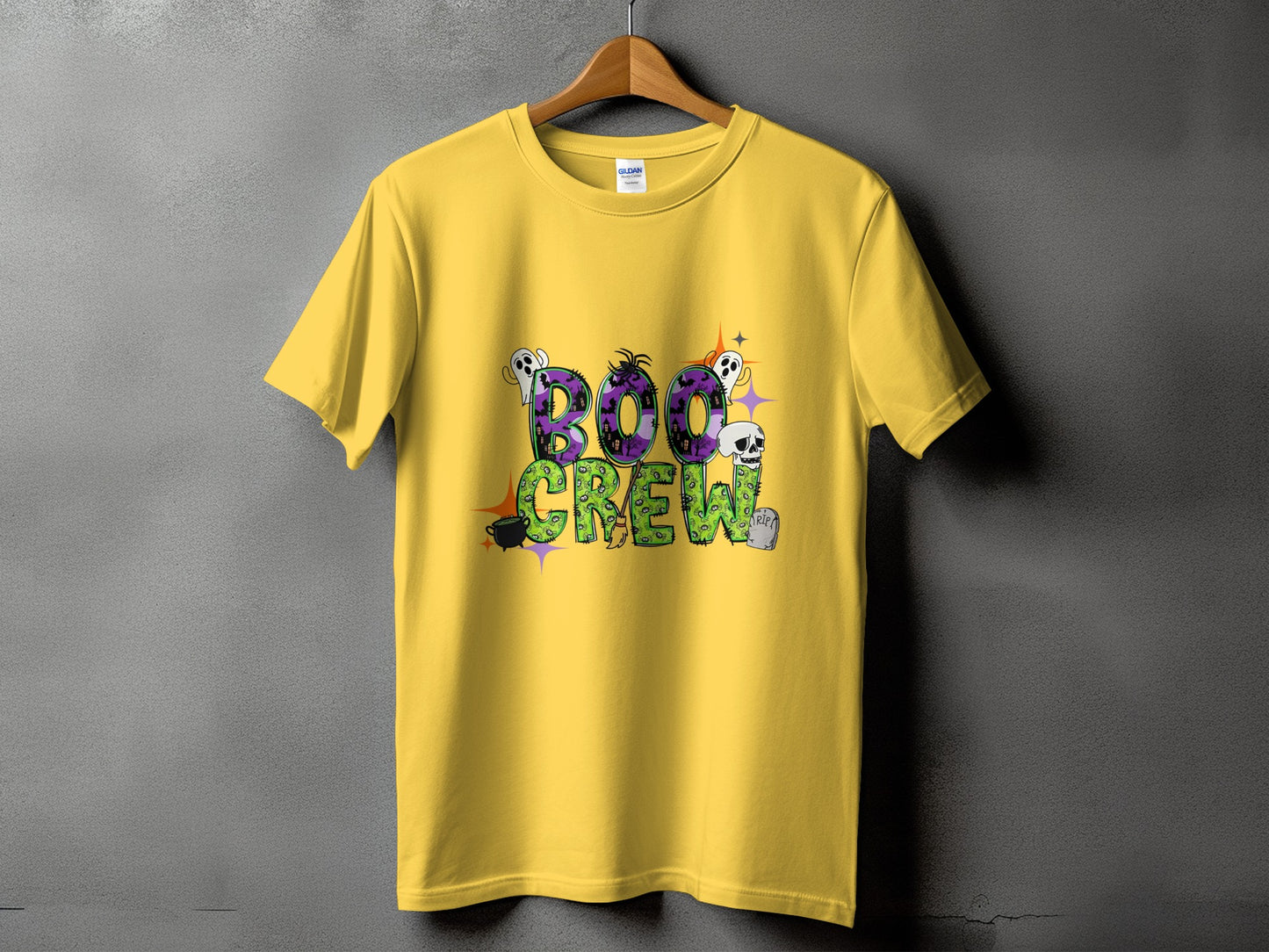 Yellow t-shirt with "BOO CREW" text and Halloween graphics.