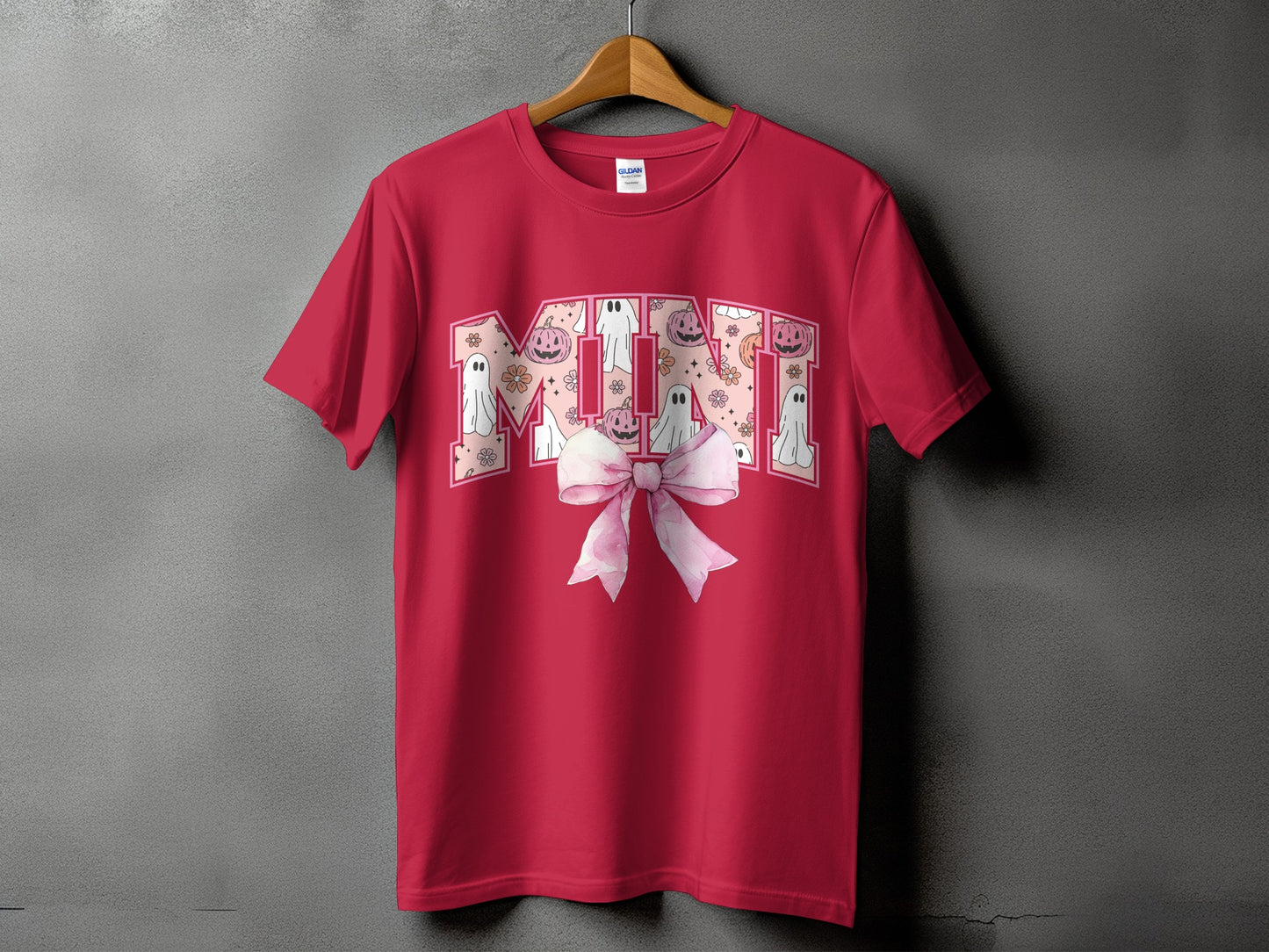 Red t-shirt with "MIMI" graphic featuring ghosts, pumpkins, and flowers, and a pink bow.