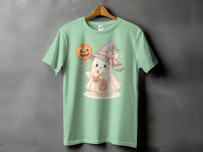 Ghost with Halloween balloon and pumpkin drink on mint t-shirt.