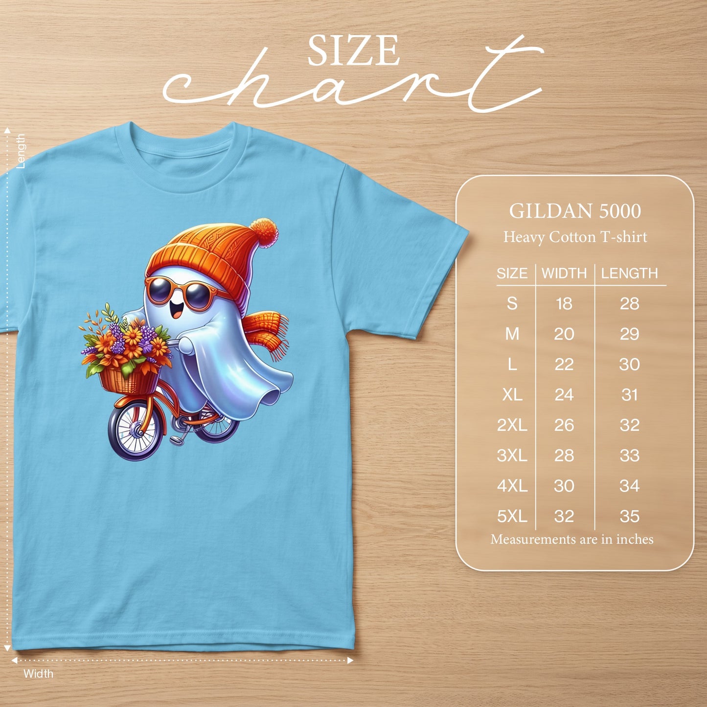 Light blue Gildan 5000 t-shirt with a ghost riding a bicycle with flowers. Size chart included.