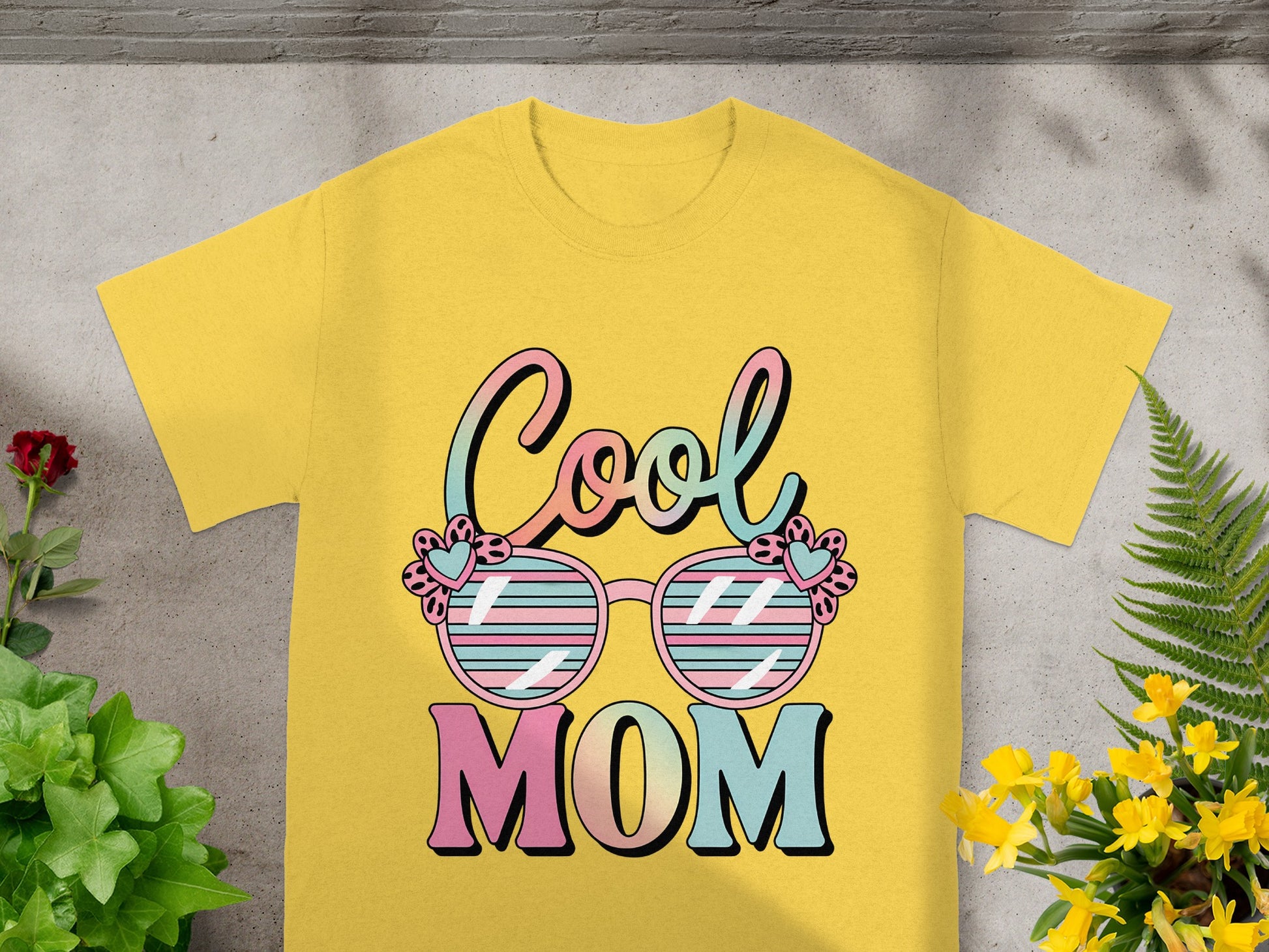 Yellow t-shirt with "Cool MOM" and sunglasses graphic.