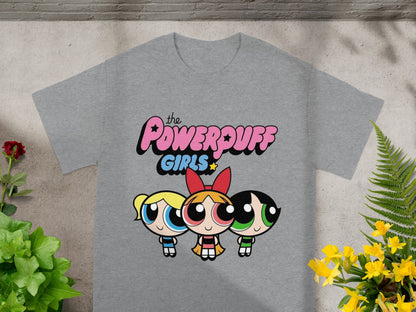The Powerpuff Girls logo and characters on a gray t-shirt.