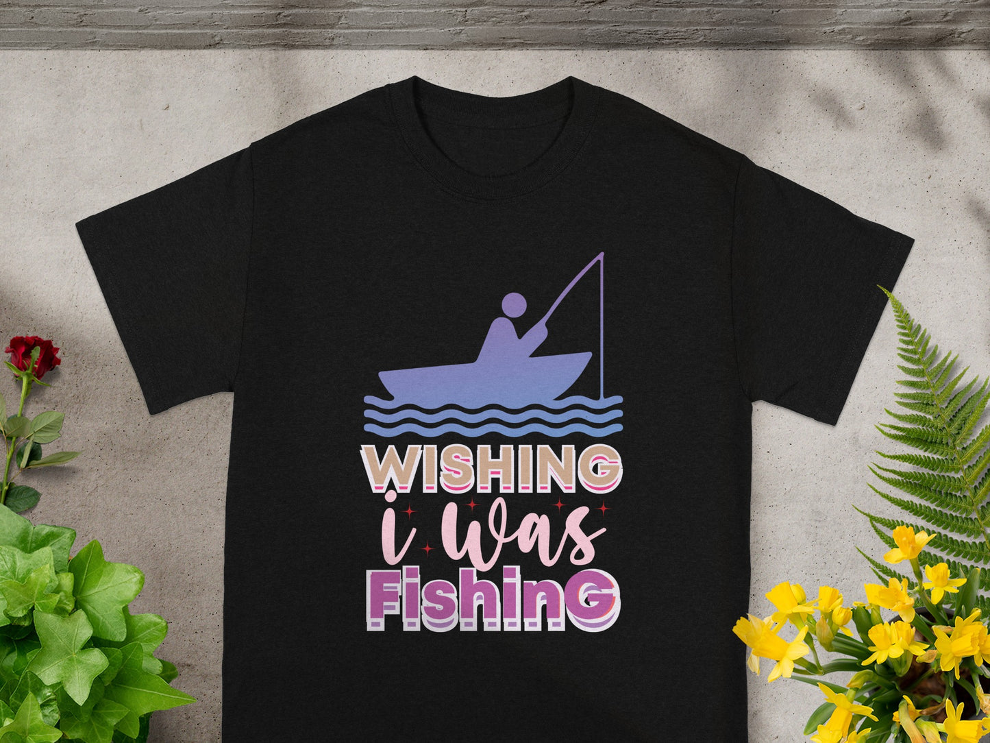 Black t-shirt with "Wishing I Was Fishing" text and a boat graphic.
