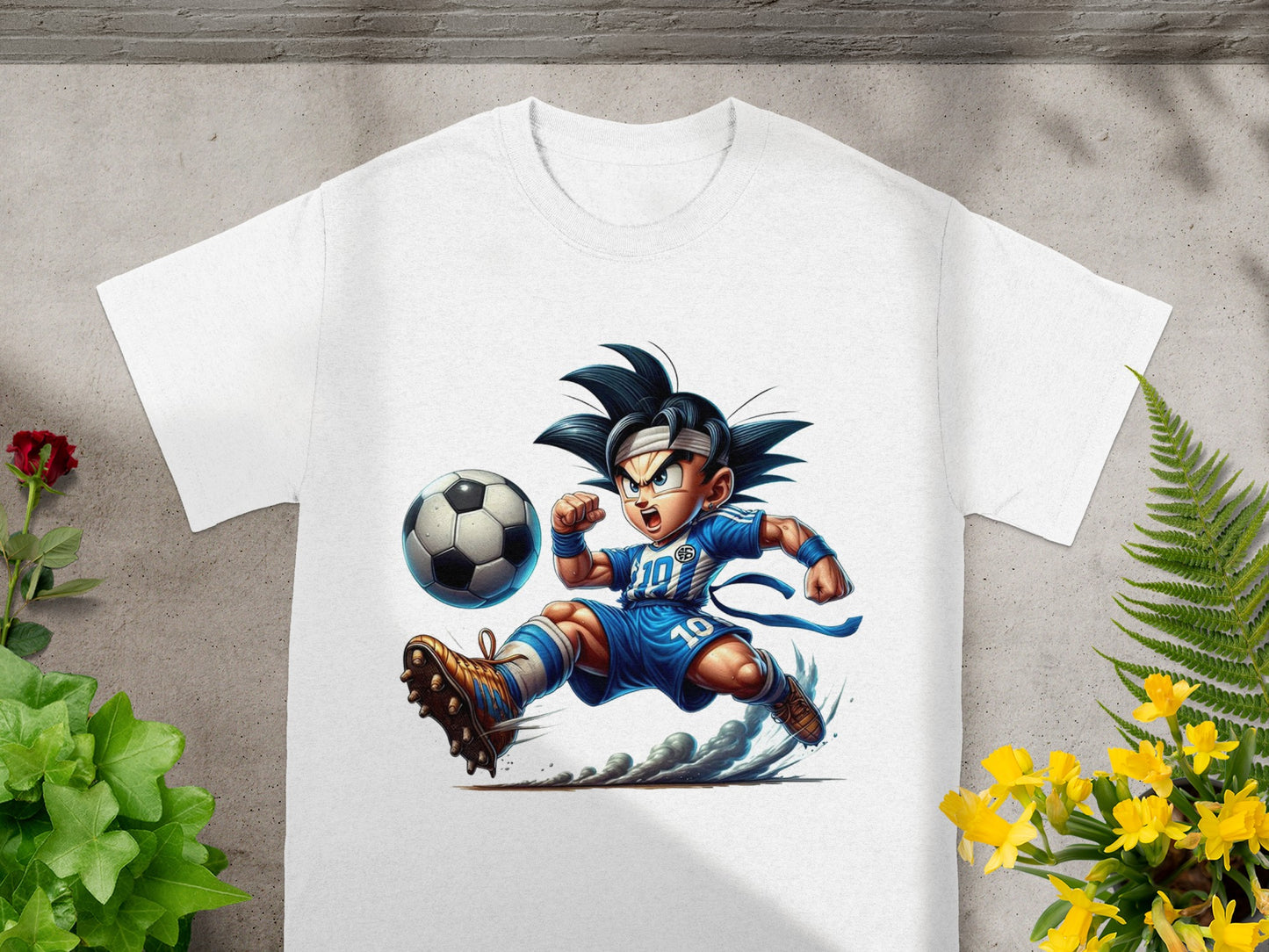 Goku character in soccer uniform kicking a ball, front of white t-shirt.