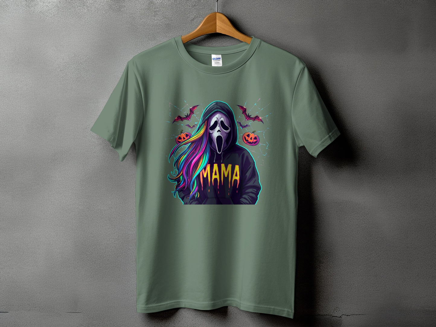 Green t-shirt with a ghost mask, rainbow hair, and "MAMA" text.