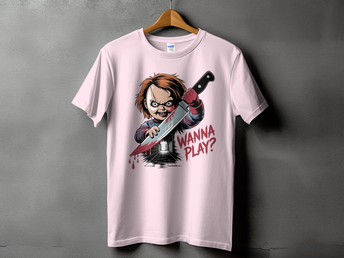 Pink t-shirt with Chucky holding a knife and text "Wanna Play?".