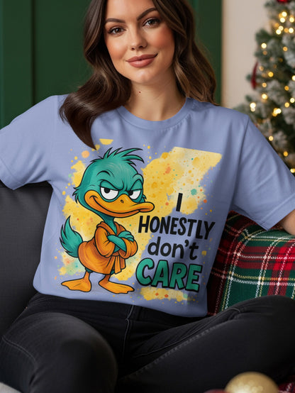 Cartoon duck wearing an orange robe on a light purple t-shirt that says "I HONESTLY DON'T CARE".