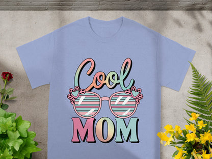 Light purple t-shirt with "Cool Mom" text and stylized sunglasses graphic.