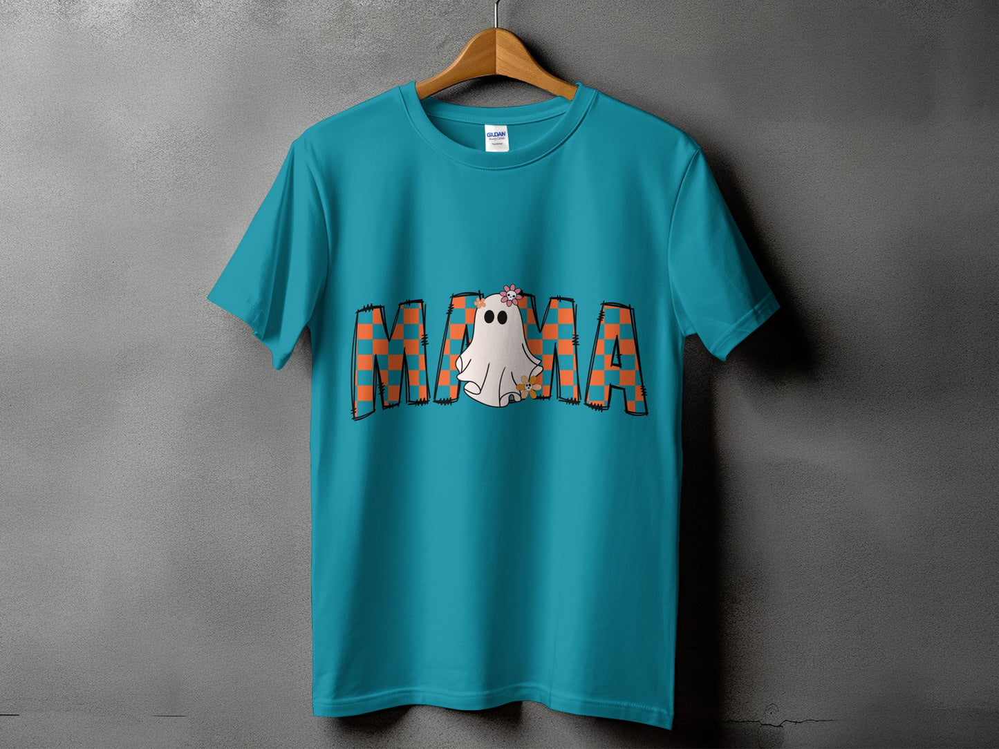 Teal t-shirt with "MAMA" text and a cute ghost wearing a flower.