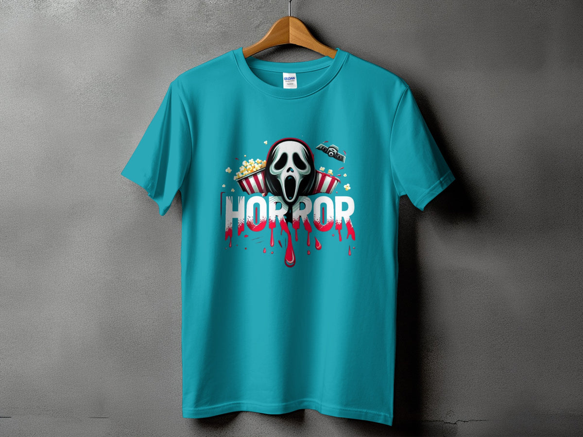 Teal t-shirt with horror mask, popcorn, and bloody text design.