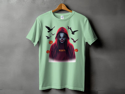 Mint t-shirt with spooky clown, ravens, and pumpkins graphic and "Mama" text.