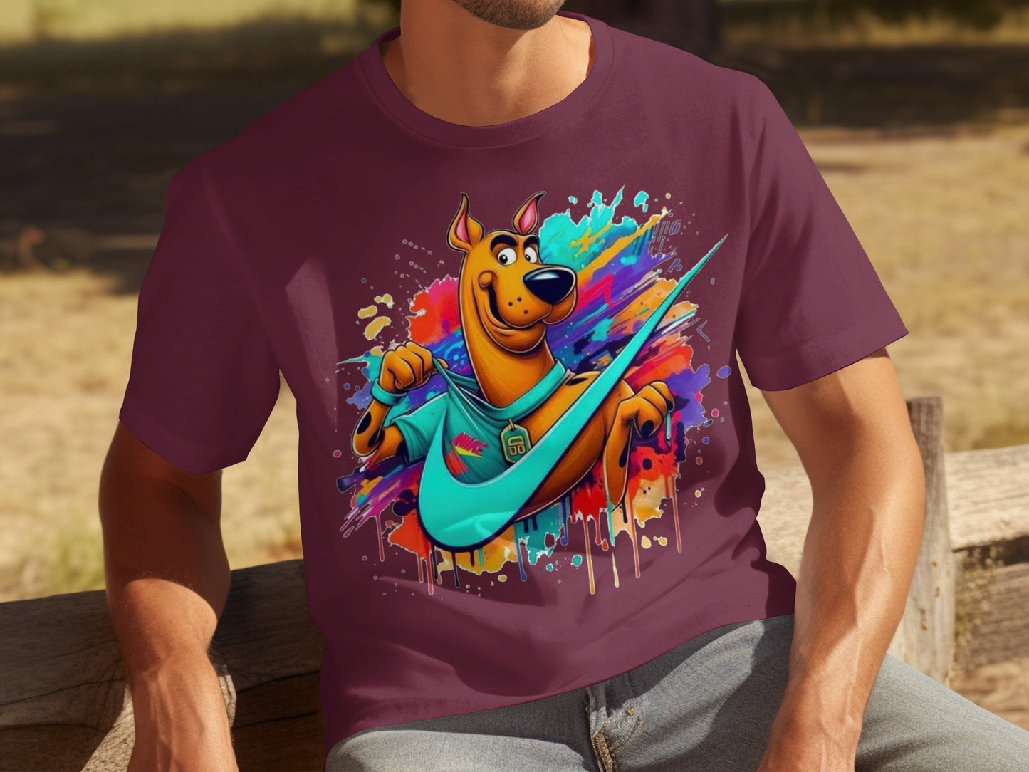 Colorful Cartoon Dog Graphic on Maroon Shirt Product