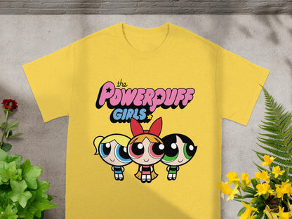 Yellow t-shirt with The Powerpuff Girls graphic featuring Blossom, Bubbles, and Buttercup.