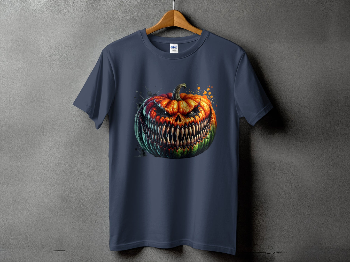 Dark t-shirt with a snarling, fanged pumpkin graphic.