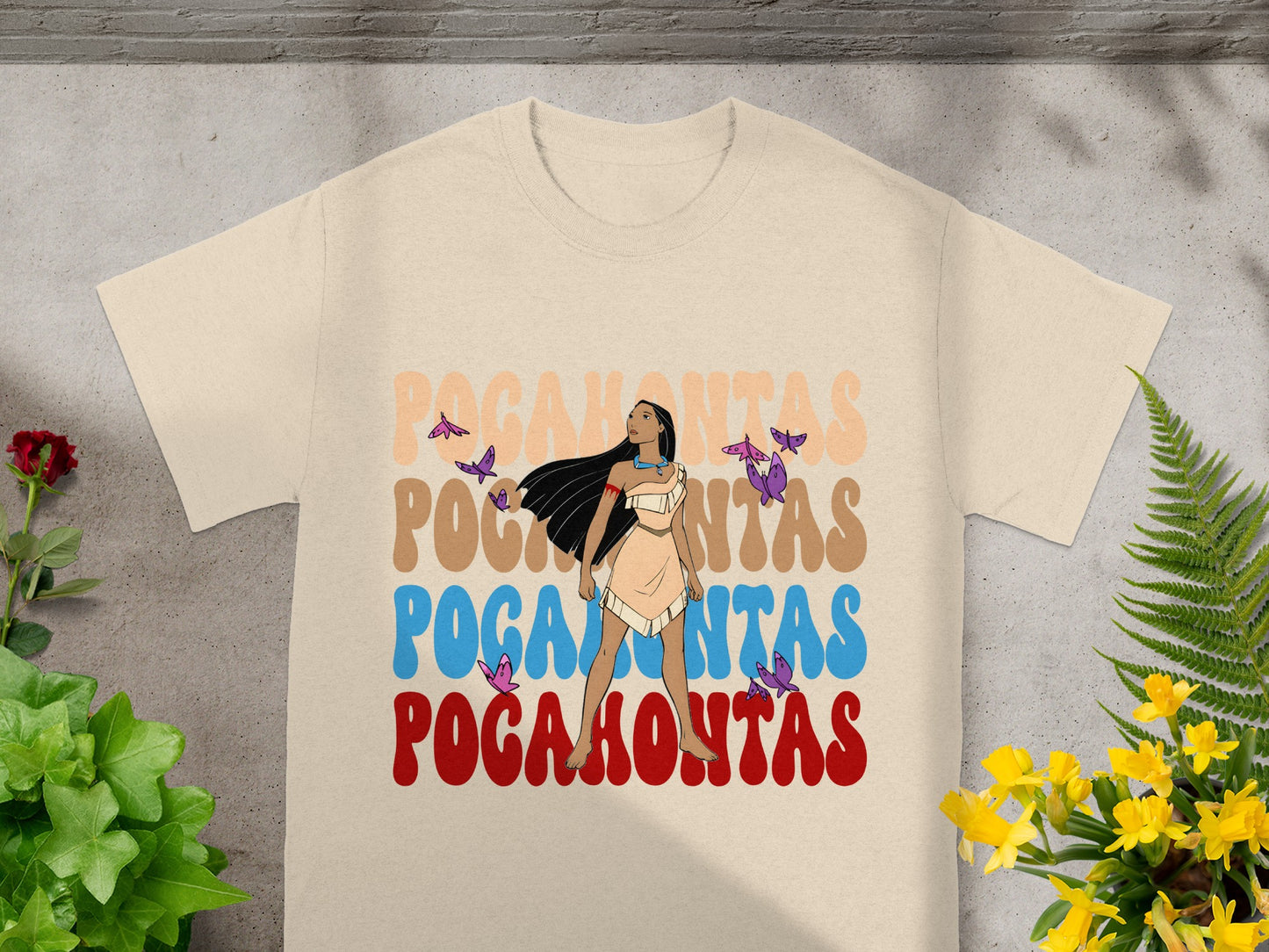 T-shirt with "Pocahontas" in stylized font and butterflies.