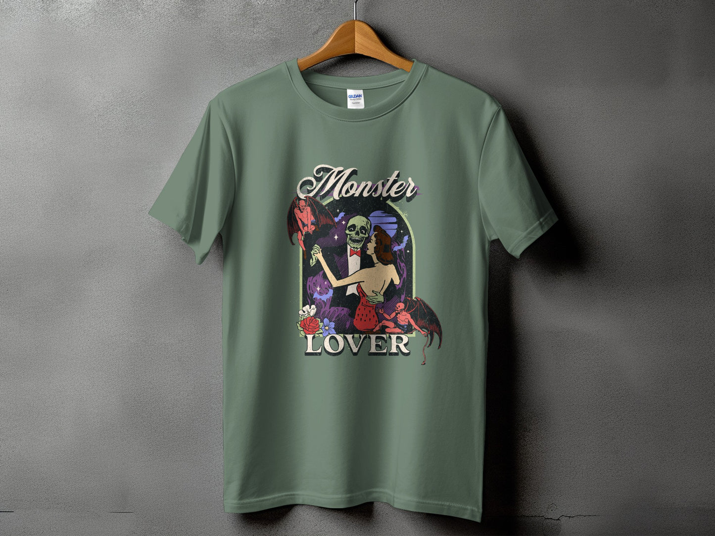 T-shirt with "Monster Lover" text and a skeleton couple dancing with devils.