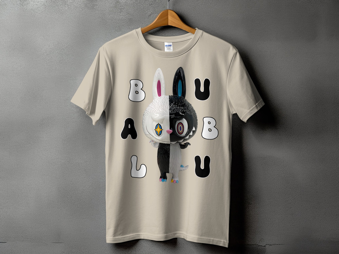 Tan t-shirt with black and white split bunny graphic and "BU BU A L U" text.