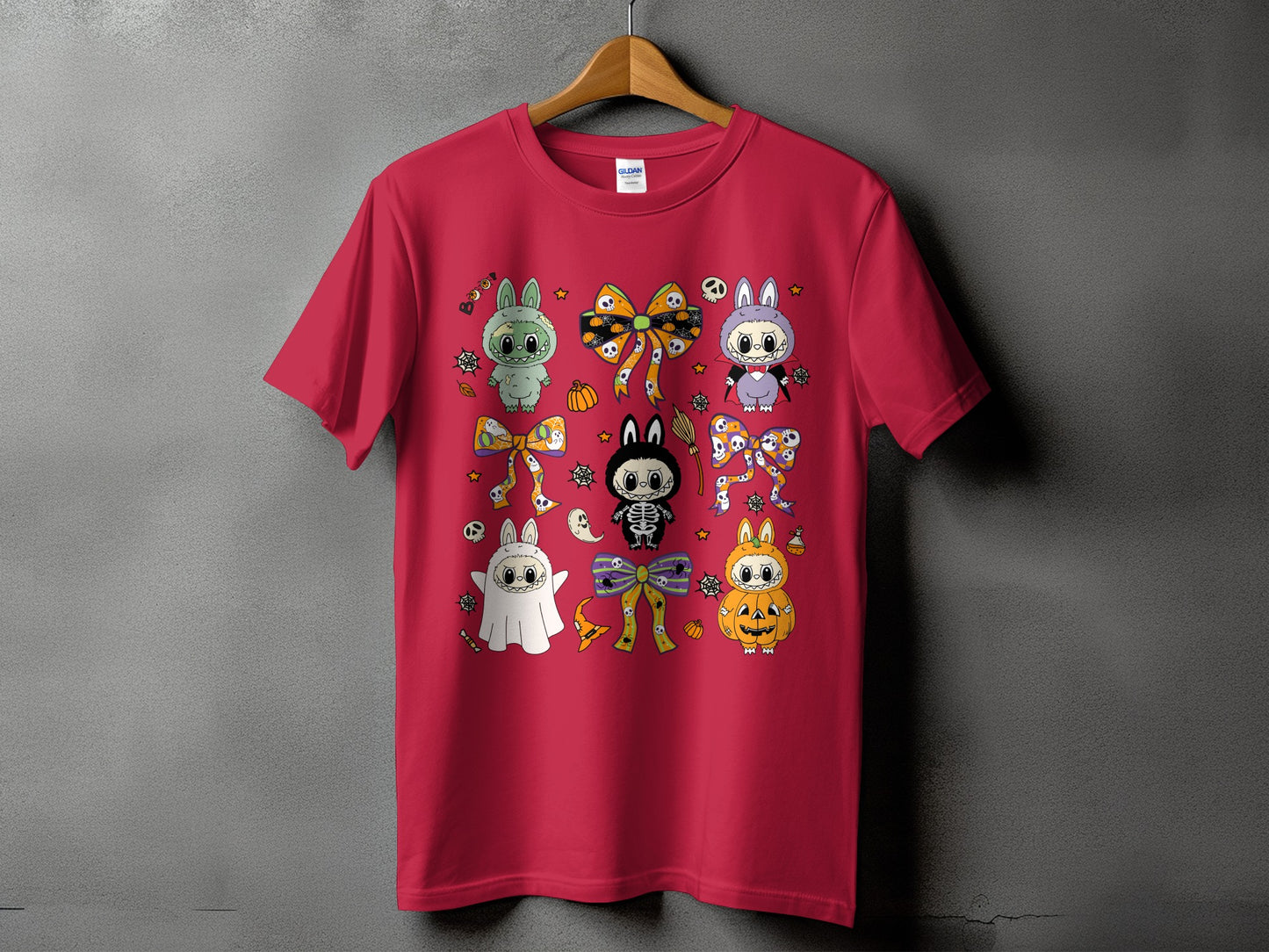 Red t-shirt featuring a Halloween-themed design of cute characters and bows.