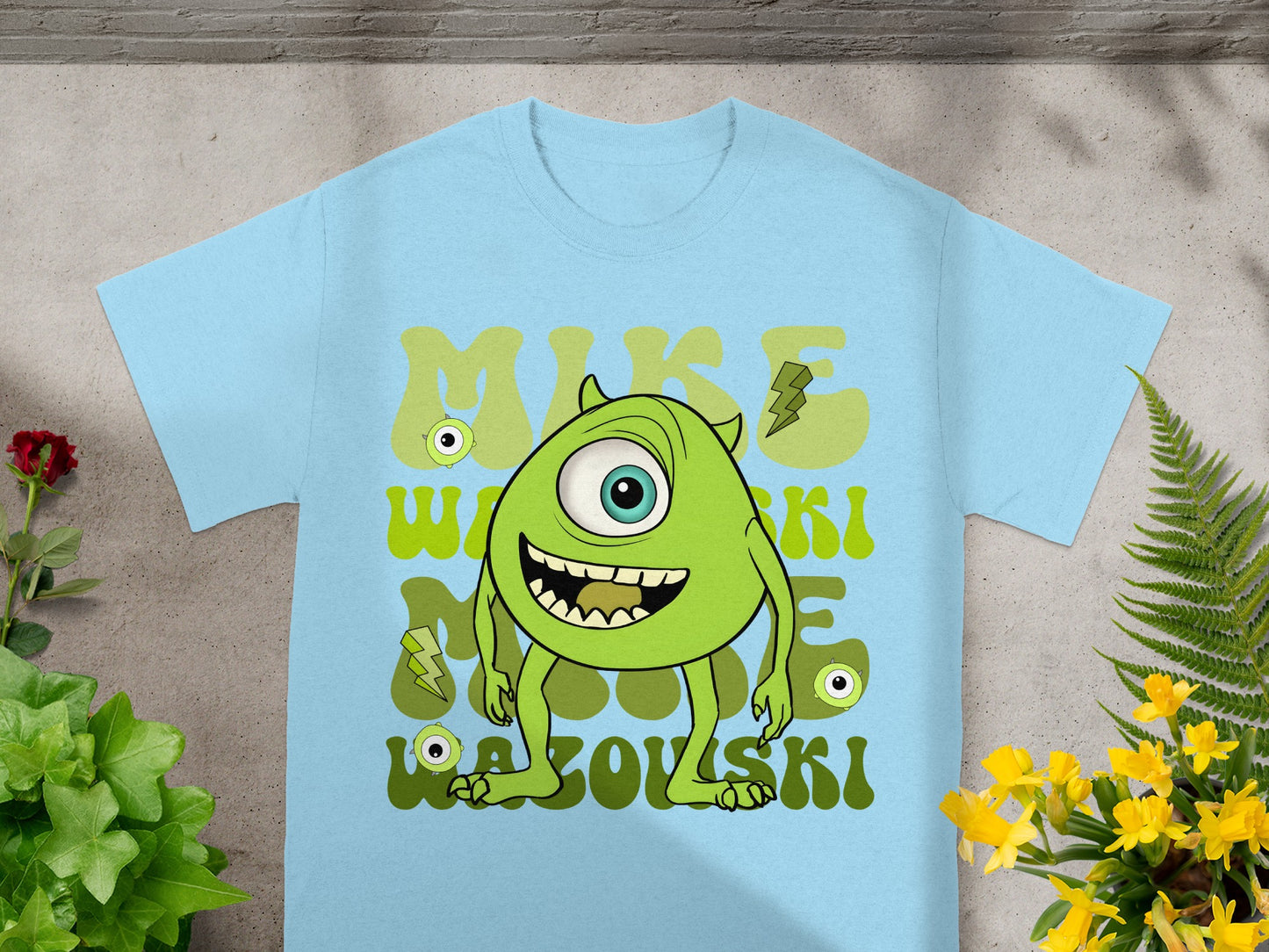 Light blue t-shirt with Sulley from Monsters, Inc. character and text.