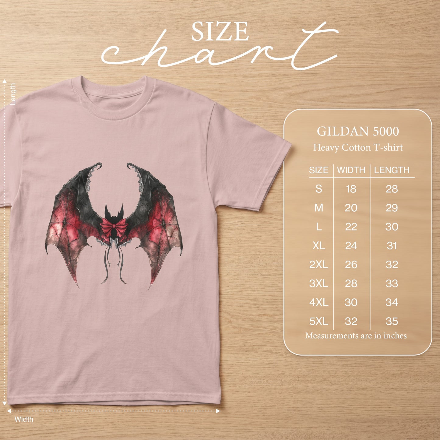 Pink t-shirt with a black and red bat graphic, Gildan 5000 size chart.