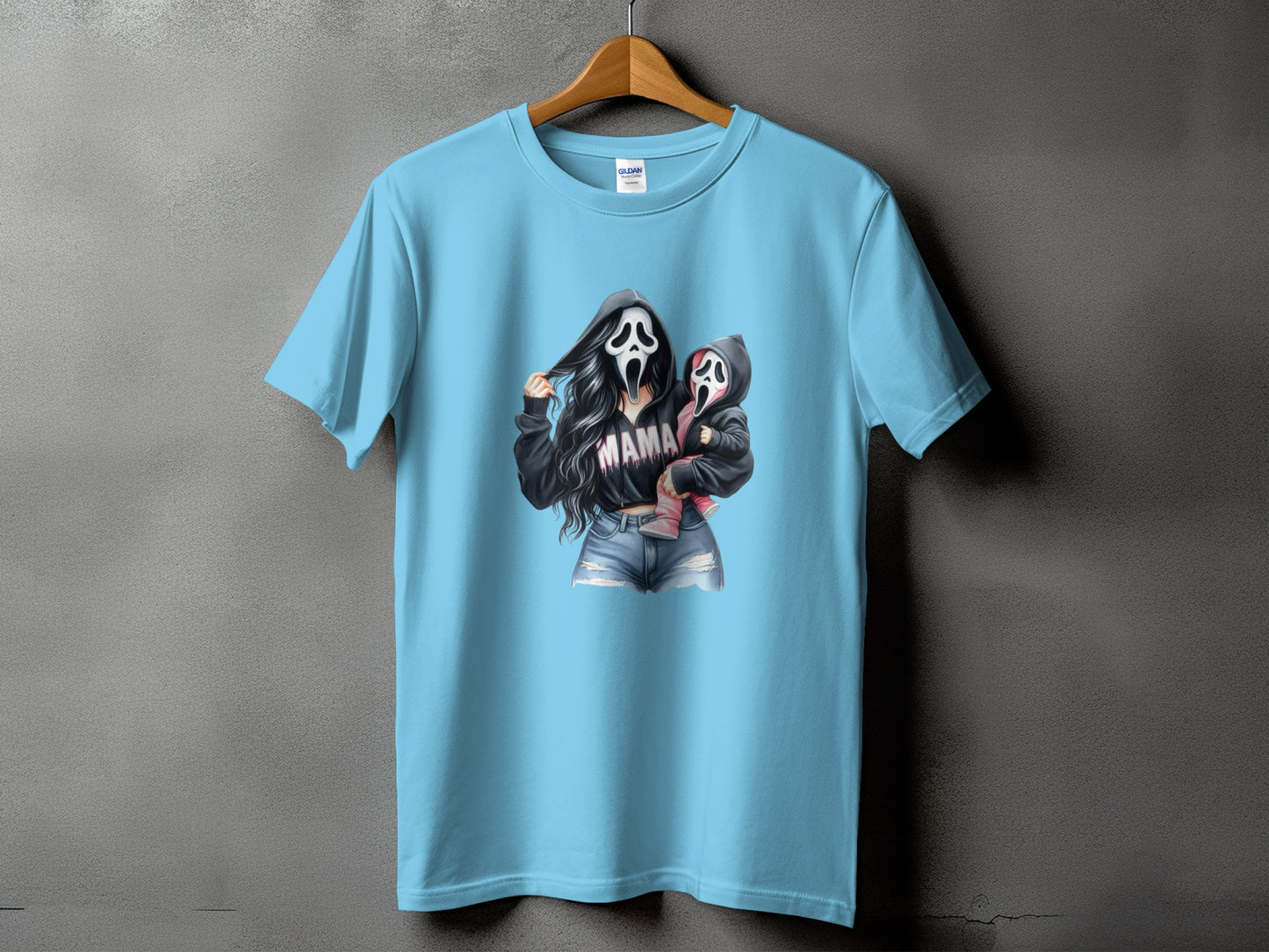 Light blue t-shirt featuring a graphic of a woman and child in Ghostface masks, with "MAMA" text.