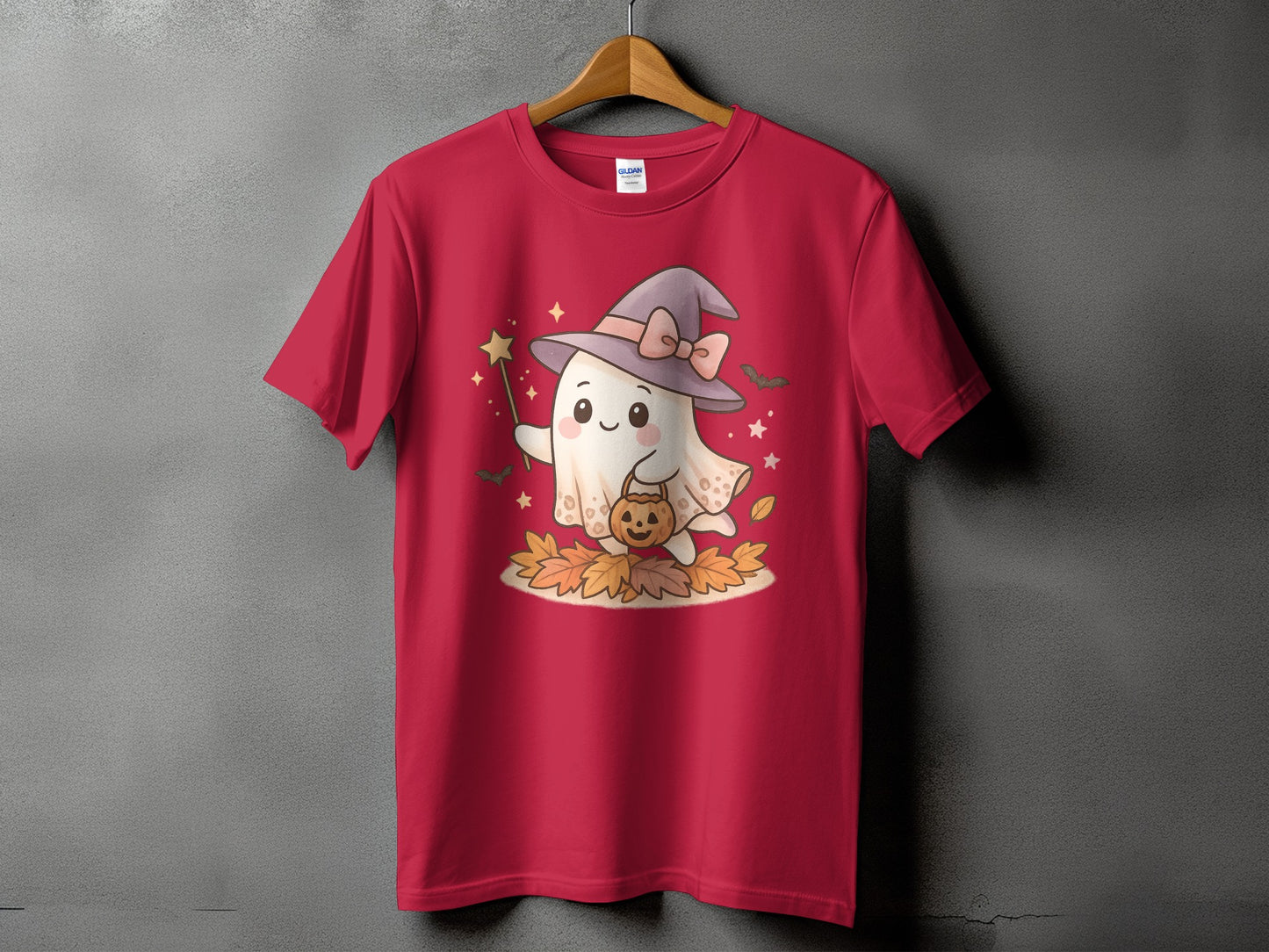 Red t-shirt with a kawaii ghost wearing a witch hat and holding a pumpkin.
