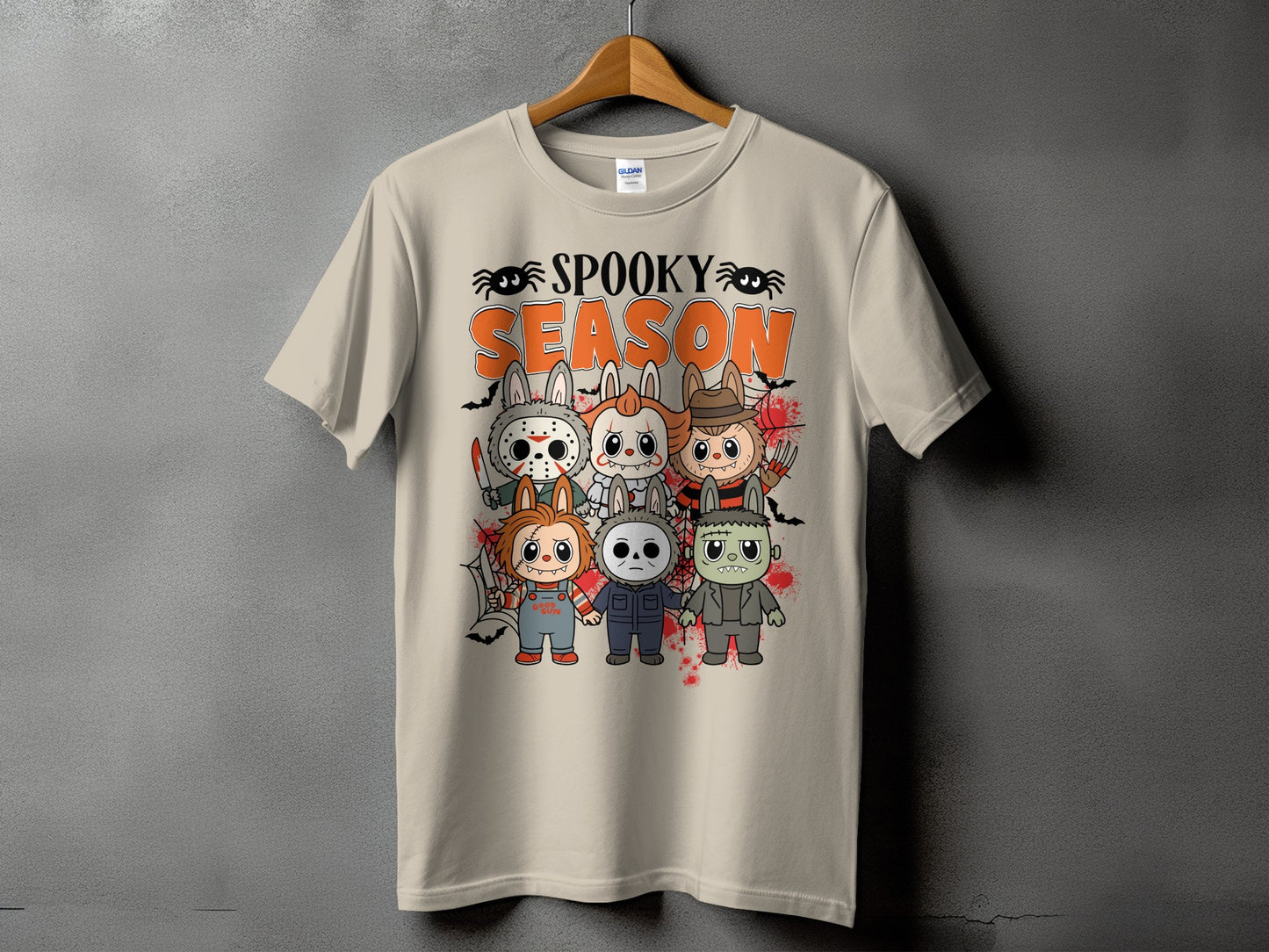 Beige t-shirt with "Spooky Season" text and cartoon horror characters.