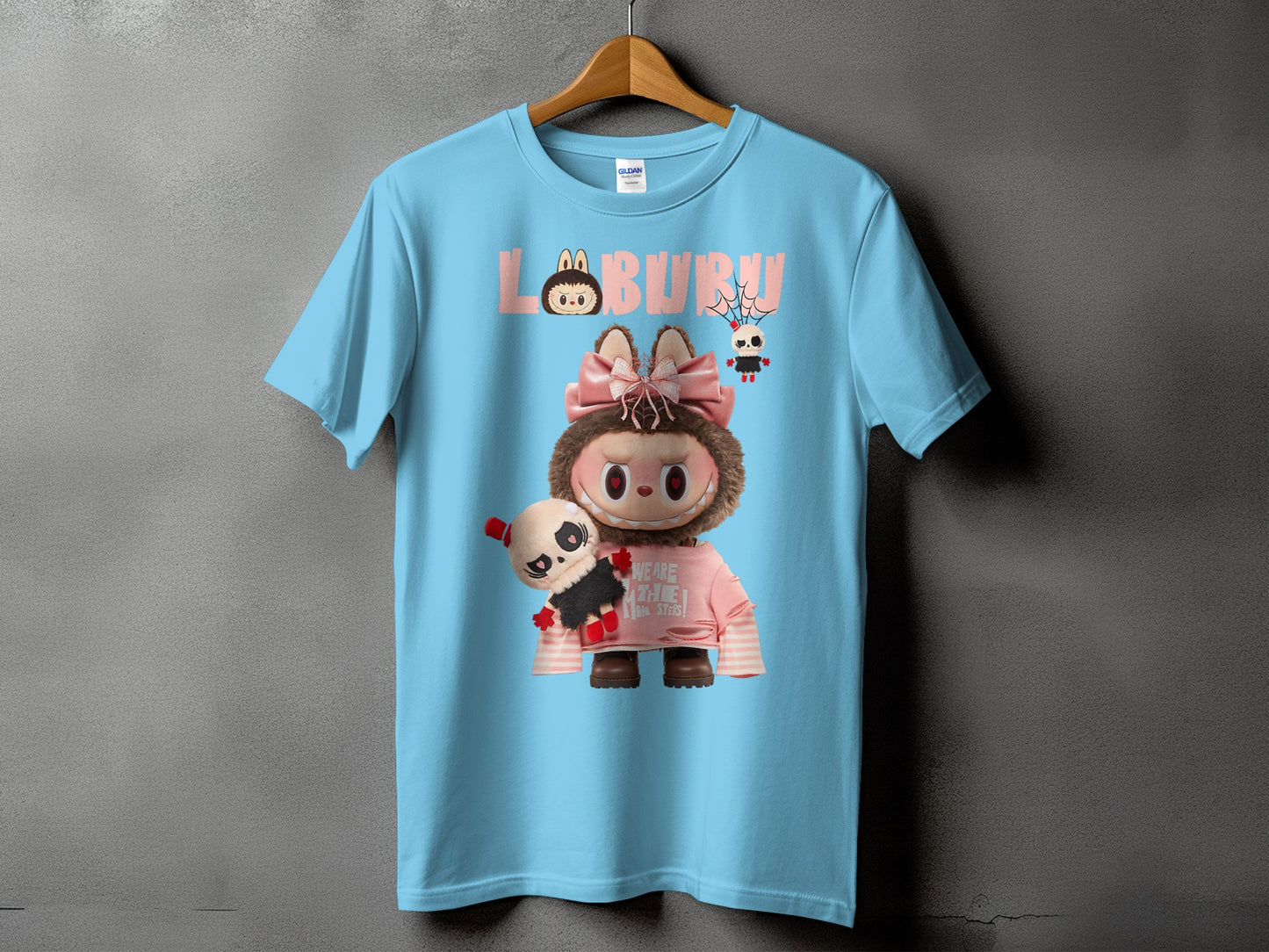 Light blue t-shirt with "LABURU" text and character graphics.
