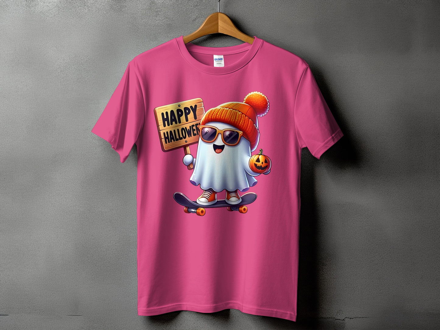 Pink t-shirt with a cartoon ghost holding a sign saying "HAPPY HALLOWEEN".