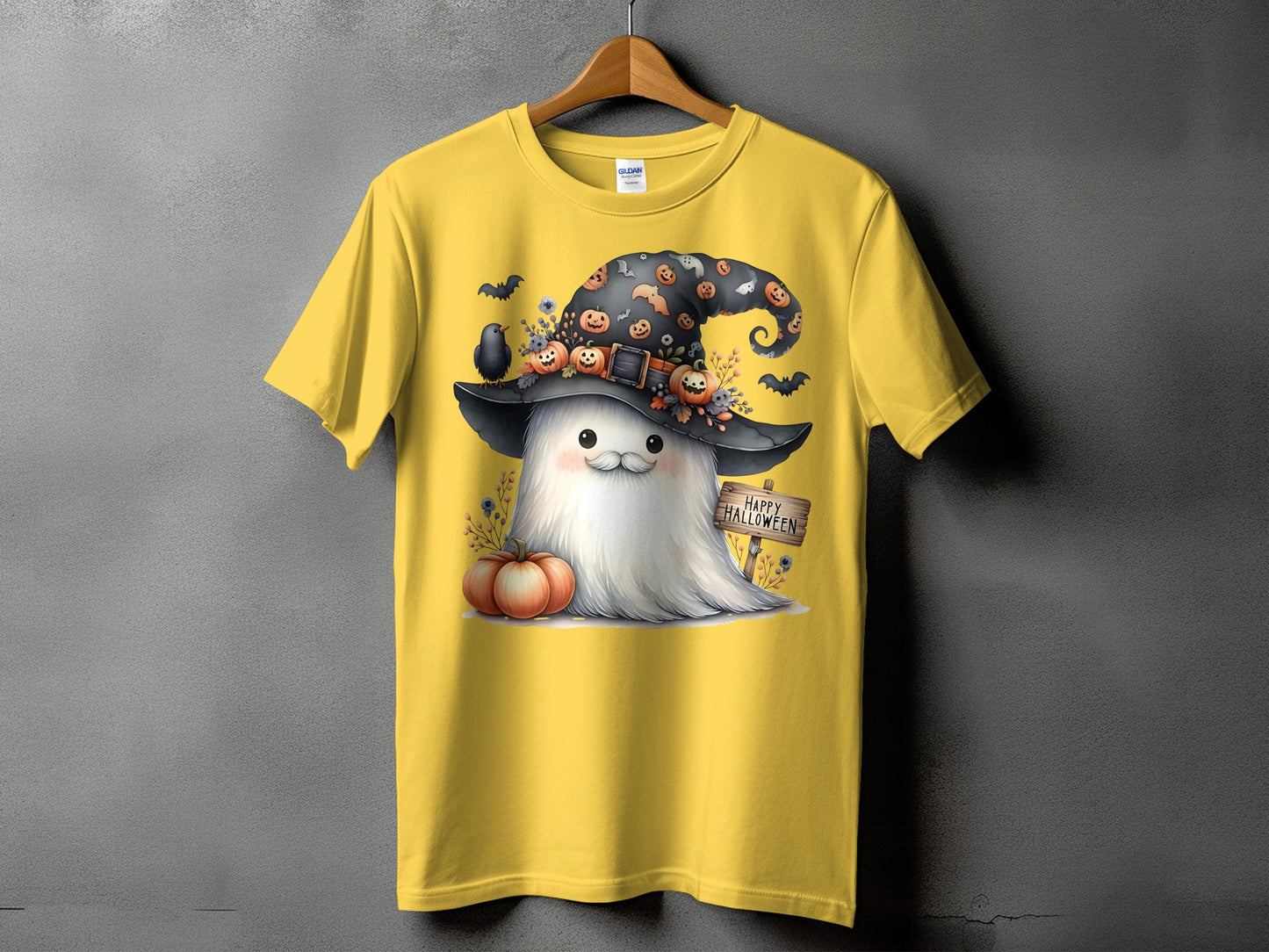 Yellow t-shirt with a cartoon ghost wearing a witch hat and a "Happy Halloween" sign.