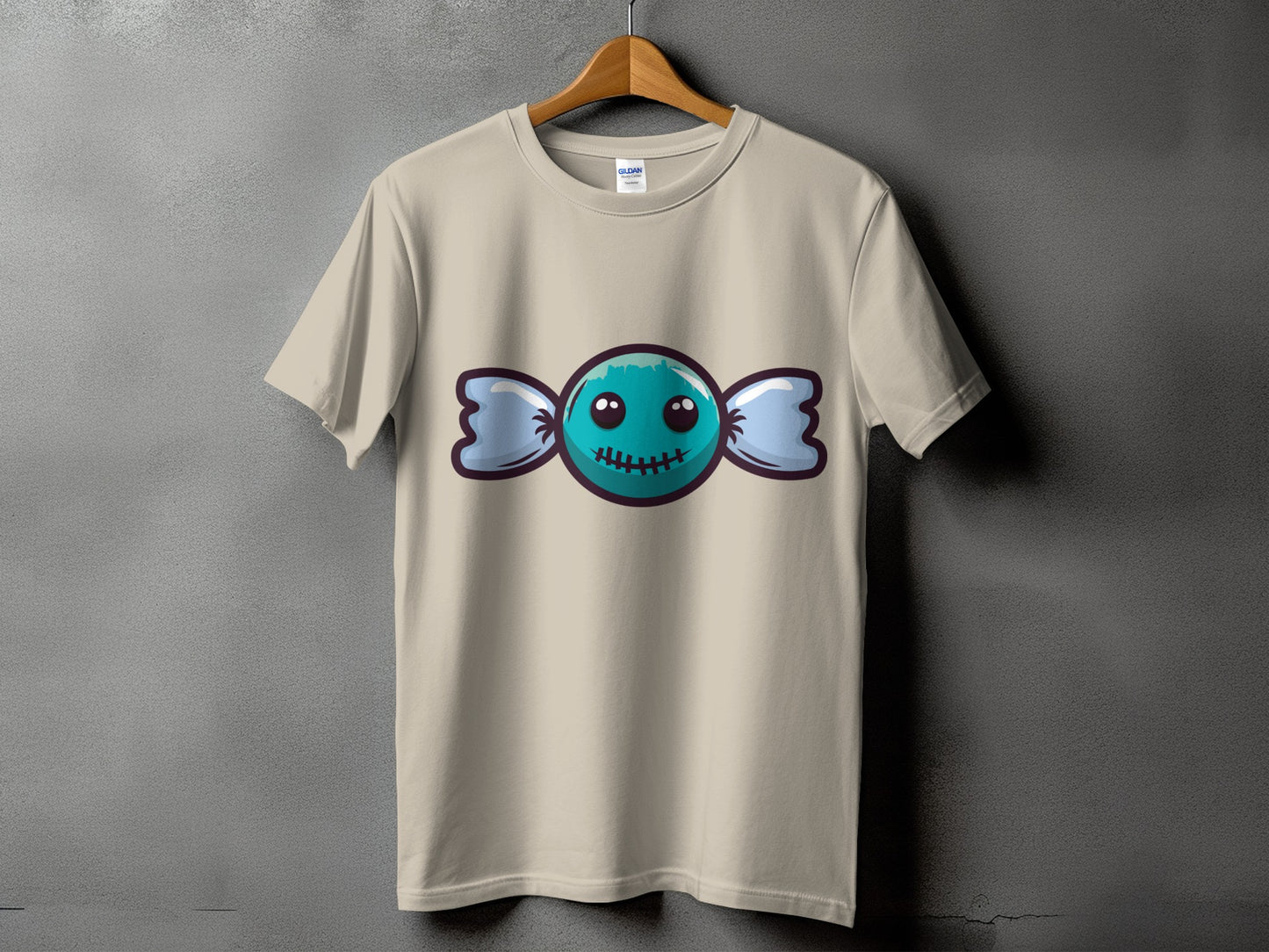 T-shirt with a cartoon candy design featuring a smiling face and bow wrappers.