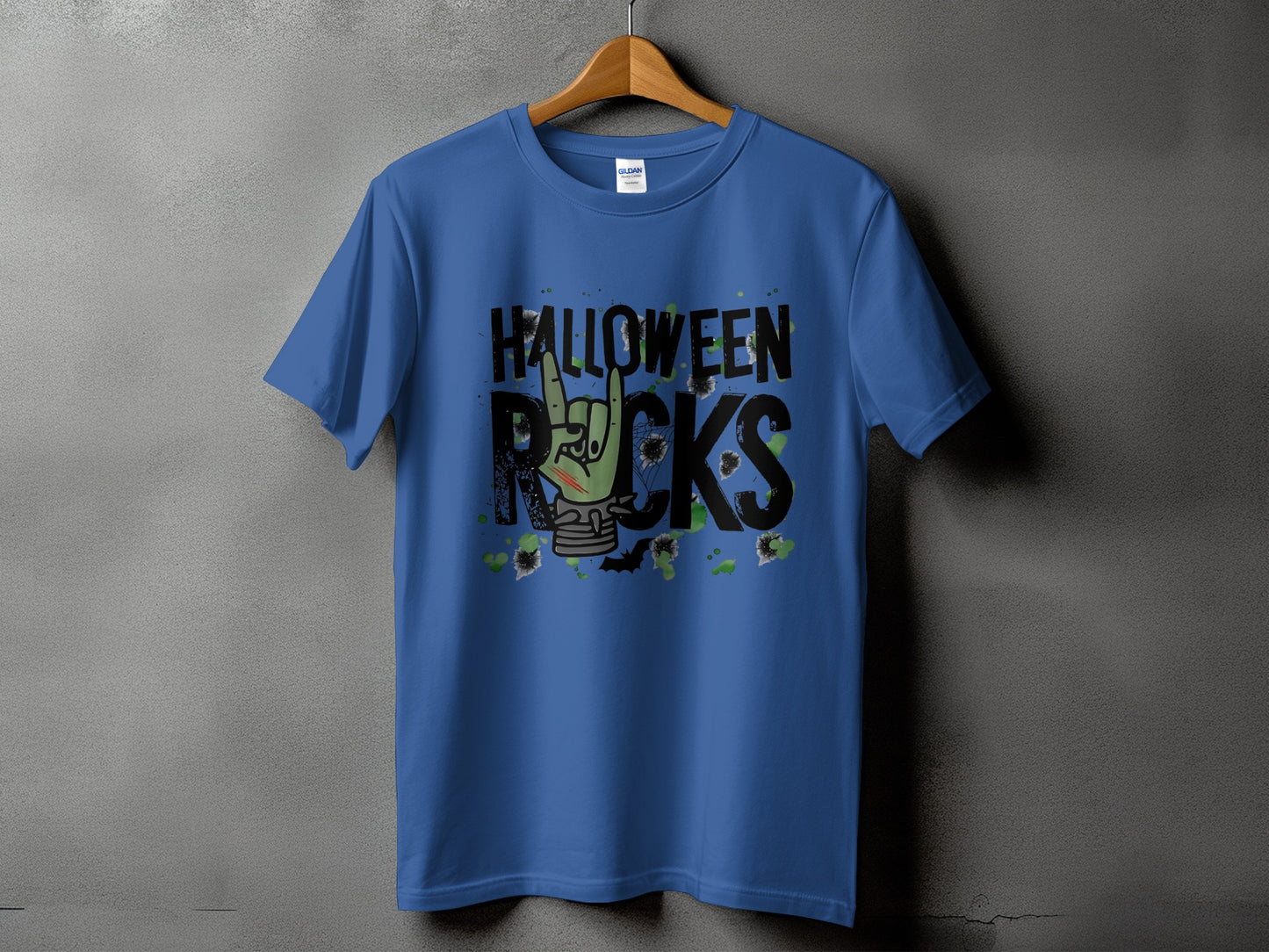 Blue t-shirt with "Halloween Rocks" text, a zombie hand, and bats.
