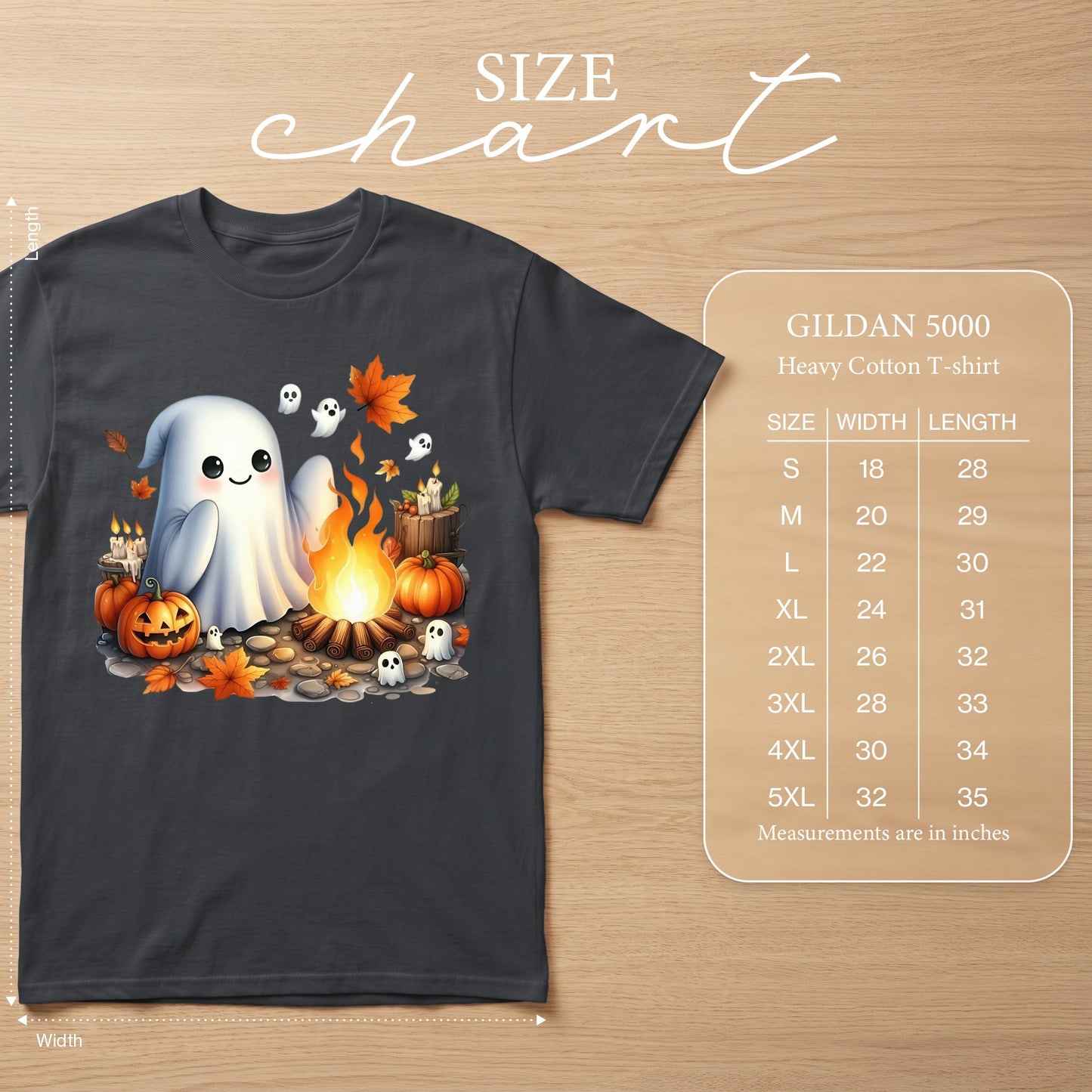 Dark gray t-shirt with cute ghosts, pumpkins, and campfire Halloween graphic and size chart.