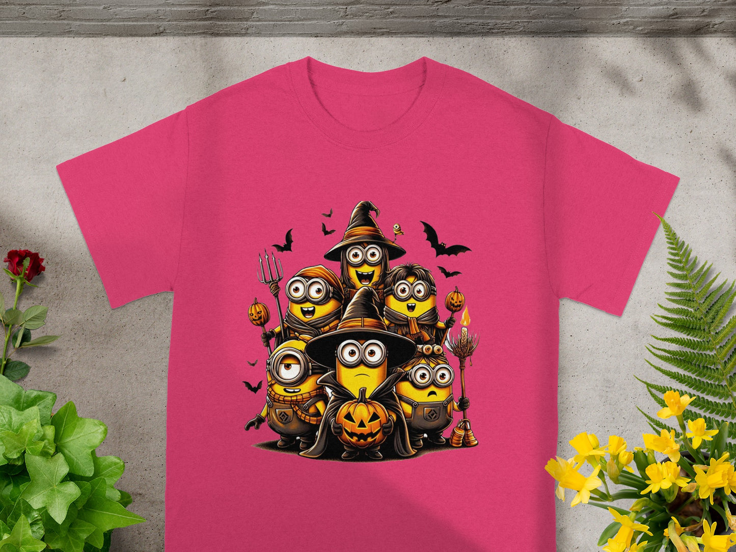 Minions in Halloween costumes including witches hats, pumpkins, and bats.